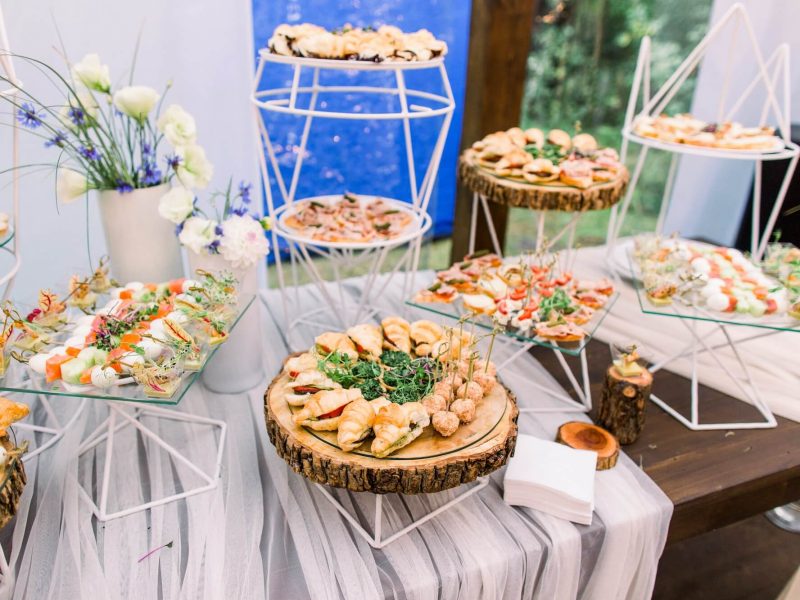 catering-buffet-and-rustic-decor-outdoor-wedding-party-with-healthy-food-snacks.jpg